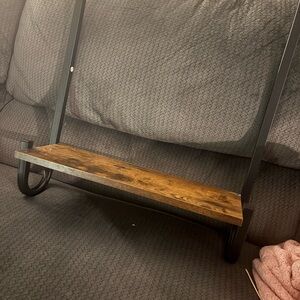 Black Metal and Brown Wood Wall Shelf